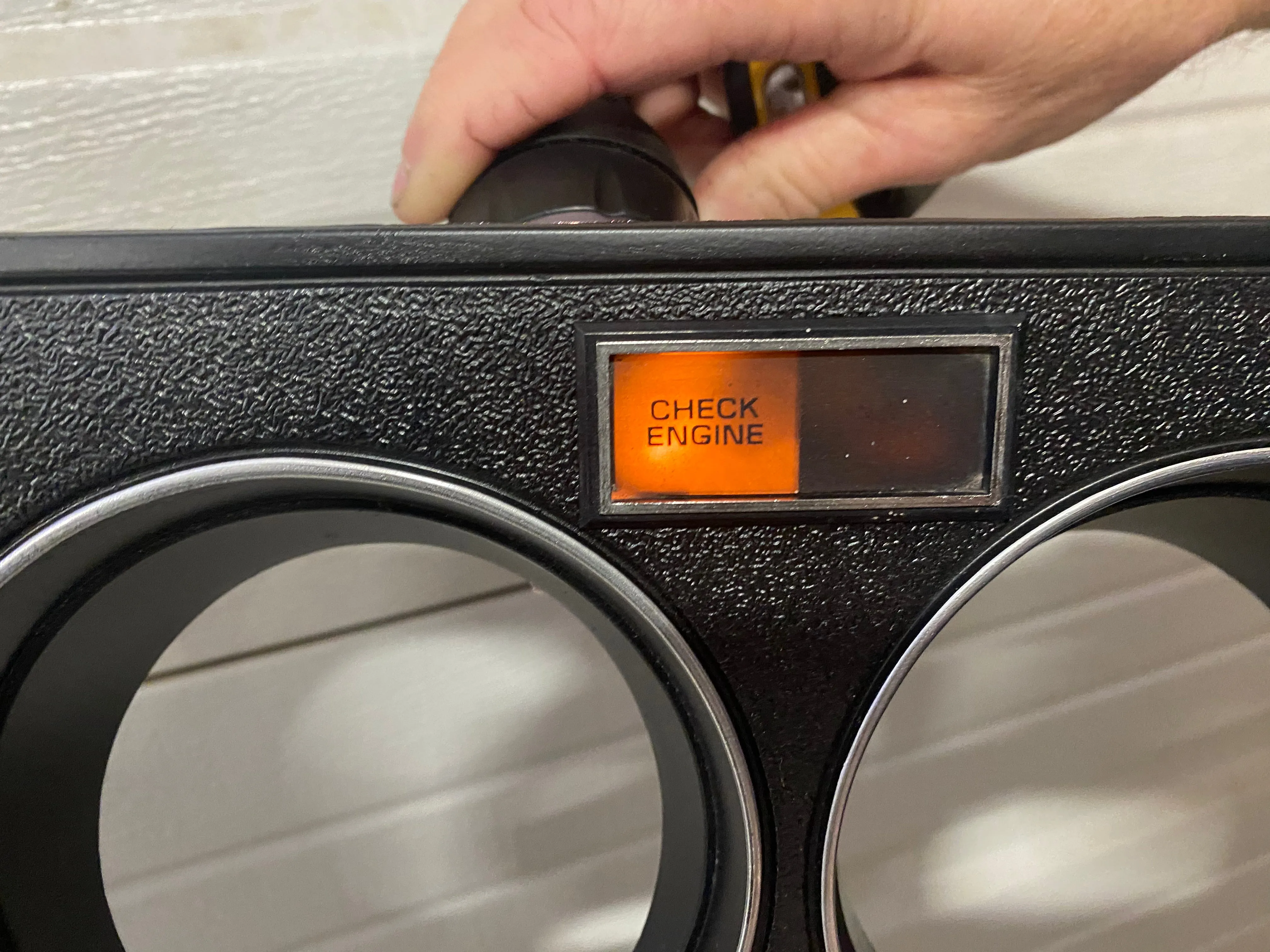 1984-1987 Good Used dash bezel, black with silver trim; New AC vent, and passenger side plate