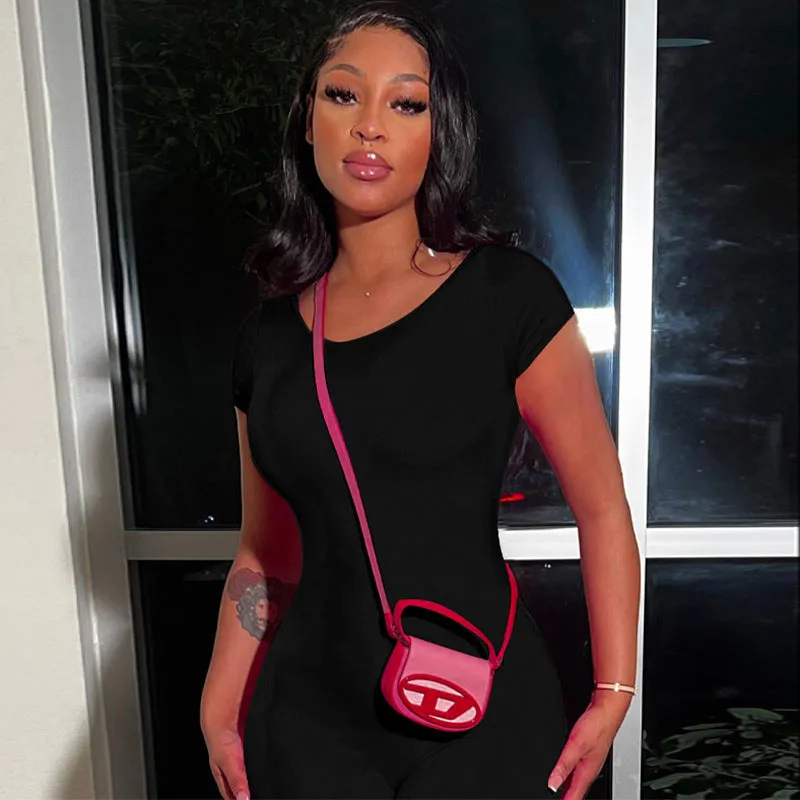 Bold and Stylish Backless Solid Pink Jumpsuit with Short Sleeves and Slim Fit Design